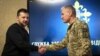 Президент України Володимир Зеленський і новопризначений голова Служби зовнішньої розвідки України Олег Іващенко (праворуч) під час представлення його колективу СЗР. Київ, 28 березня 2024 року