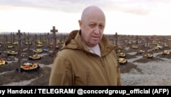 Евгений Пригожин на кладбище погибших бойцов ЧВК «Вагнера» в поселке Горячий Ключ на юге России Краснодарского края. Скриншот из видео, которое вышло 6 апреля 2023 года