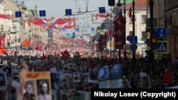 9 мая 2019 года. Санкт-Петербург, Невский проспект. Прохождение участников всероссийского патриотического проекта "Бессмертный полк".
