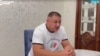"Хутор" тобына қатысы бар деген Хасан Қасымбаев. Orda.kz басылымы жариялаған видеодан скриншот.