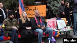Armenia - Opposition Raffi Hovannisian (R) gives a press conference in Yerevan's Liberty Square where he continues his hunger strike, 13Mar2013. 
