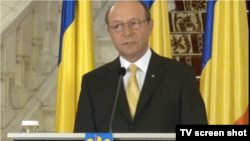 Romania, president Traian Basescu warning against the new Romanin gvt "attacking state institutions"