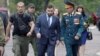 Временный глава "ДНР" Денис Пушилин (в центре) приезжает на церемонию собственной инаугурации. Донецк, 15 сентября 2018 года