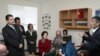 Armenia -- Prime Minister Tigran Sarkisian (L) and U.S. Ambassador Marie Yovanovitch (C) meet with beneficiaries of U.S. assistance provided under the Millennium Challenge Account program, 15Apr2011.