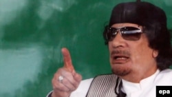 Libyan leader Muammar Qaddafi was said to have made "thuggish" threats.