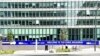 Poster "Bulgaria, welcome to the Euro" is seen in Brussels near the European comission