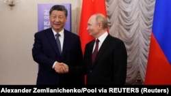 Xi și Putin la cea mai recentă întâlnire, din 22 octombrie 2024, în marja summit-ului BRICS găzduit de Rusia la Kazan.