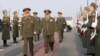 Armenia - General Valery Gerasimov (L), chief of staff of Russia's armed forces, and his Armenian counterpart, General Yuri Khachaturov, inspect an honor guard before their talks in Yerevan, 15Feb2013.