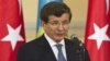 Kazakhstan - Turkey's Foreign Minister Ahmet Davutoglu speaks during a news briefing with Kazakhstan's Foreign Minister Yerlan Idrisov in Almaty, 26Apr2013