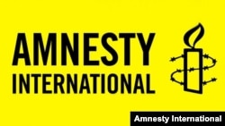 Символика международной правозащитной организации Amnesty International. 