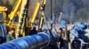 Будаўнічыя работы на адрэзку нафтаправоду «Дружба» паміж Мазыром і Берасьцем у 2018 годзе. Ілюстрацыйнае фота
