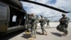 Soldaţi americani din misiunea de pacificare a NATO în Kosovo, 1 iulie 2014