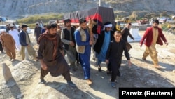 The day before the bomb blast that killed a female doctor in Jalalabad, residents gathered to bury the three media workers gunned down by Islamic State militants. 