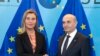 Belgium -- EU foreign policy chief Federica Mogherini poses with Kosovar Prime Minister Isa Mustafi in Brussels, February 9, 2015