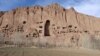 This photo shows dozens of caves and the empty alcove that once housed Solsol, a 55-meter high statue of the Buddha.