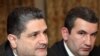 Armenia -- Prime Minister Tigran Sarkisian (L) and Artak Shaboyan, head of the State Commission on the Protection of Economic Competition (SCPEC), at an international seminar in Yerevan, 21Mar2011.