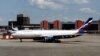 Avion za Kubu na moskovskom aerodromu Šeremetjevo