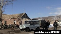 Armenia -- A police car patrols Charchakis village to prevent further election-related violence, 12Jan2010.
