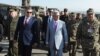 Armenia - President Serzh Sarkisian and Russian Defense Minister Anatoly Serdyukov (L) monitor CSTO military exercises at the Marshal Bagramian training ground, 19Sep2012.