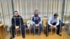 Зьлева направа: намесьнік дырэктара ЗЛіН Раман Волкаў, былы начальнік аддзелу ЗЛіН Максім Казлоў, генэральны дырэктар «Брянсксельмашу» Валерый Сулееў