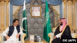 Pakistani Prime Minister Imran Khan (left) on a previous visit to Saudi Arabia.