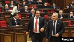 Armenia - Prosperous Armenia Party leader Gagik Tsarukian (C) attends a parliament session in Yerevan, 04Feb2013.