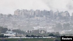Tancurile israeliene în interiorul Fâșiei Gaza, văzute din Israel.