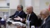 Afghan President Ashraf Ghani (center) and Chief Executive Abdullah Abdullah (left) attend a meeting in Kabul.