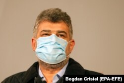 ROMANIA -- Marcel Ciolacu, the leader of Social Democracy Party (PSD), addresses to the media after first exit-polls results were announced, at the PSD headquarters, during the parliamentary elections in Bucharest, December 6, 2020